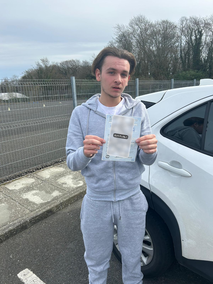 Passed learner holding a privacy-protected practical driving test certificate